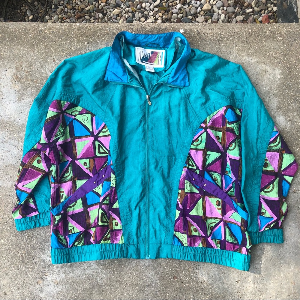 Active Code retro 80s windbreaker. 
•teal, blue, purple colors and shapes